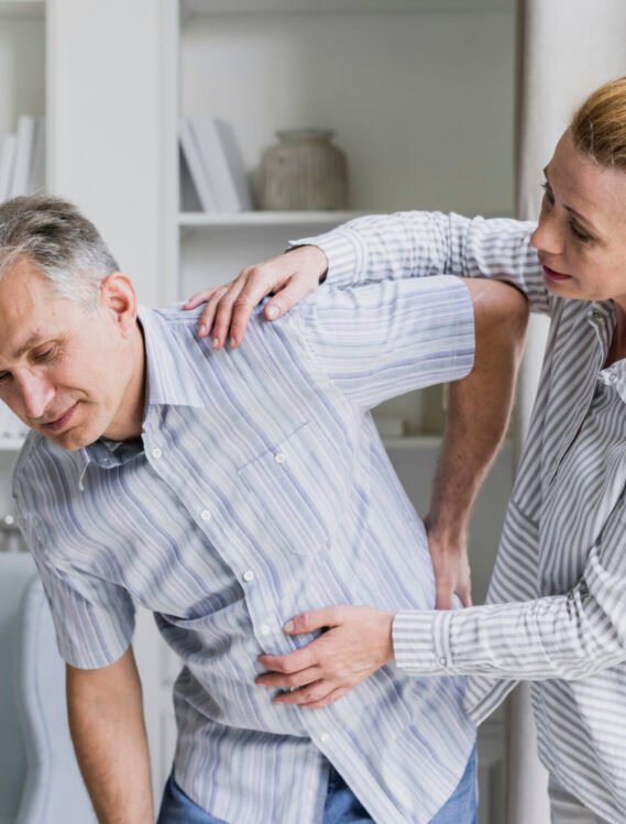 front-view-woman-man-with-back-pain.jpg