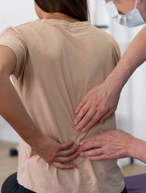 medical-assistant-helping-patient-with-physiotherapy-exercises