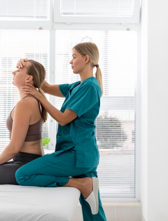 physiotherapist-helping-patient-her-clinic.jpg (1)
